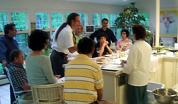 Guide To Cooking Classes - Chef Vanda to teaching a group of people how to cook